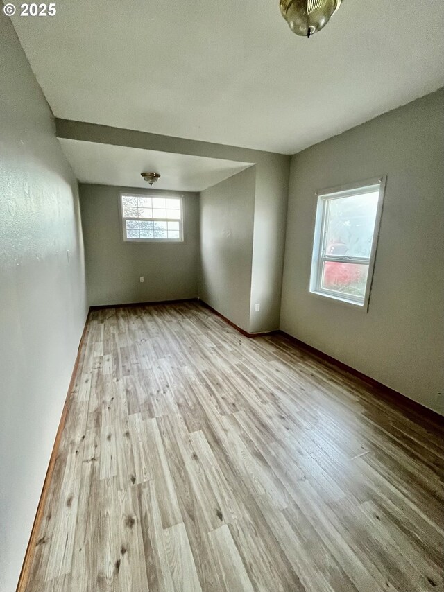 855 Myrtle Ave, Reedsport, OR 97467 - empty room featuring baseboards and wood finished floors