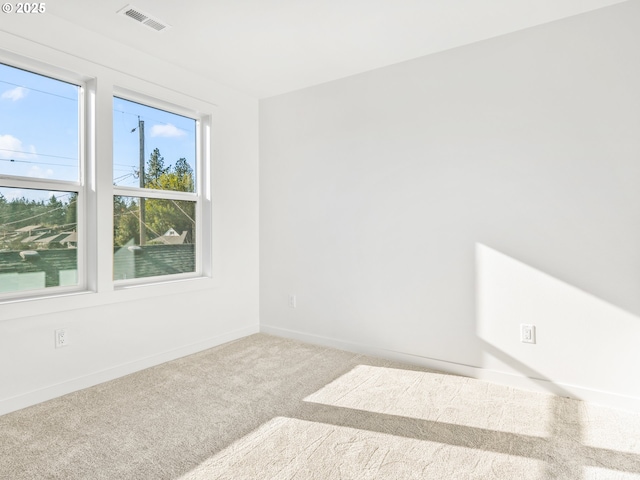 empty room featuring carpet flooring