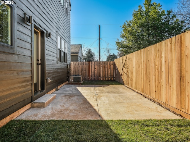 view of patio with central air condition unit