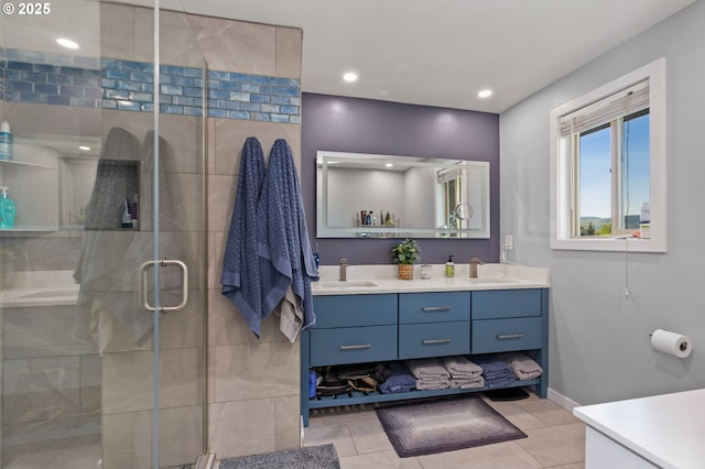 301 S 18th St, La Grande, OR 97850 - bathroom featuring double vanity, a stall shower, tile patterned floors, and recessed lighting