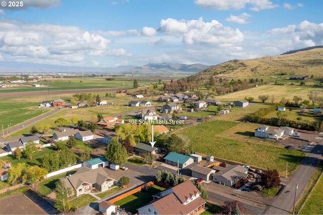 301 S 18th St, La Grande, OR 97850 - aerial overview of property's location featuring nearby suburban area and mountains