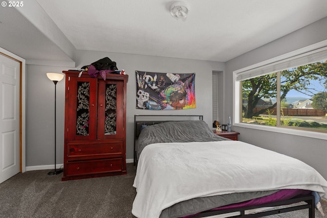 301 S 18th St, La Grande, OR 97850 - bedroom with dark colored carpet and baseboards