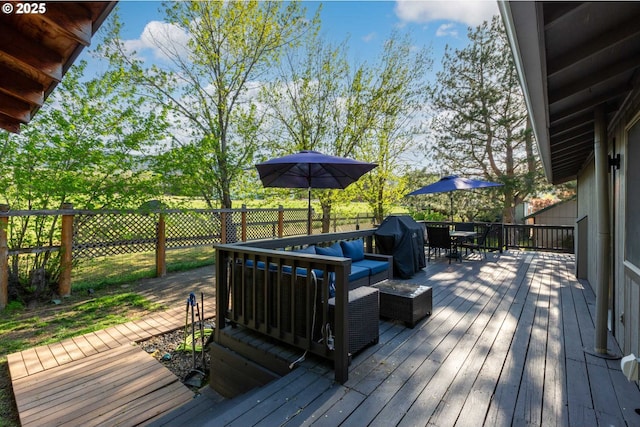 301 S 18th St, La Grande, OR 97850 - wooden terrace featuring outdoor dining space, an outdoor living space, and a fenced backyard