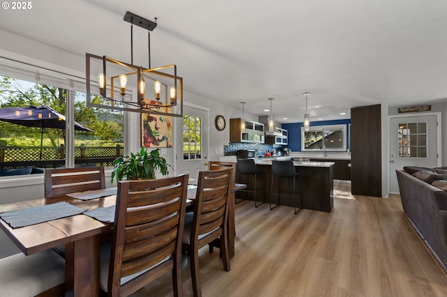 301 S 18th St, La Grande, OR 97850 - dining space featuring light wood-style flooring, a chandelier, and recessed lighting