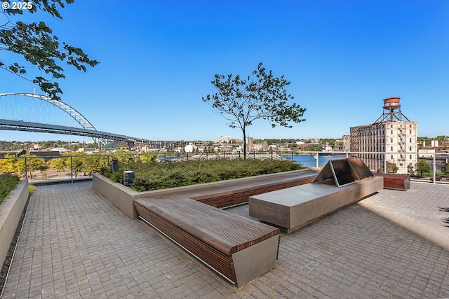 view of patio / terrace with a water view