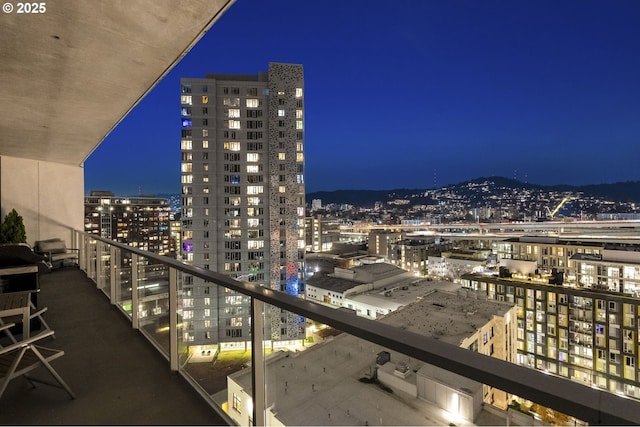 view of balcony at twilight