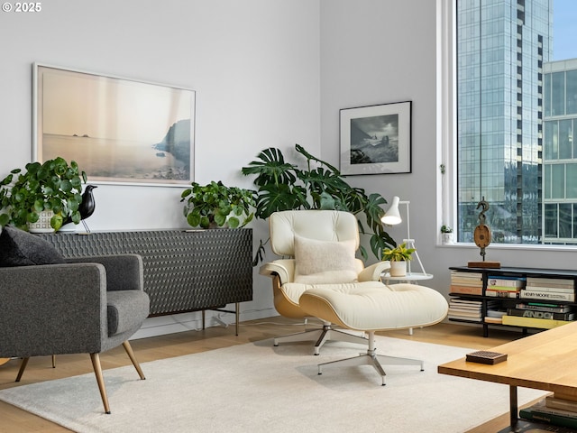 living area with wood-type flooring