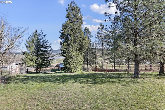 view of yard featuring fence