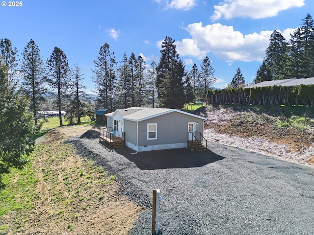 exterior space with crawl space