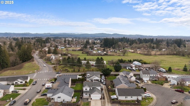 aerial view featuring a residential view and a mountain view