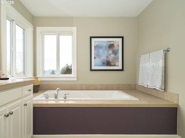2600 Umpqua Ln, West Linn, OR 97068 - full bathroom with healthy amount of natural light, a garden tub, and vanity