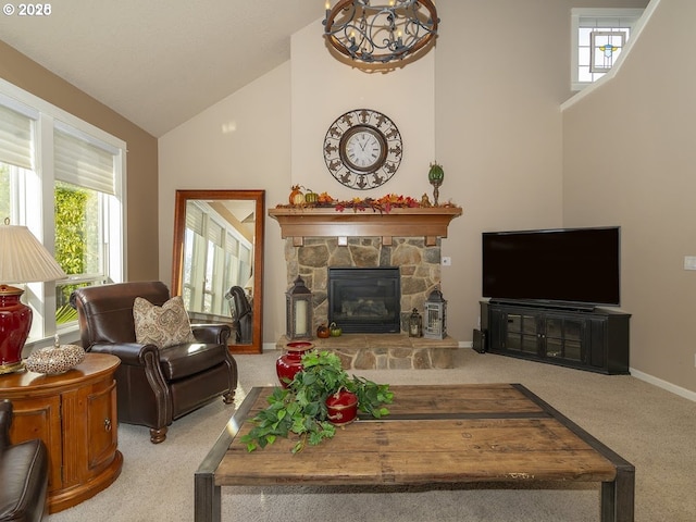 2600 Umpqua Ln, West Linn, OR 97068 - carpeted living room featuring high vaulted ceiling, plenty of natural light, a fireplace, and baseboards