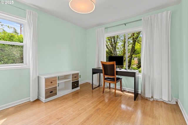 3416 SE 63rd Ave, Portland, OR 97206 - home office with light wood-style floors and baseboards