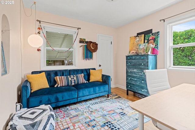 3416 SE 63rd Ave, Portland, OR 97206 - living room featuring wood finished floors and baseboards