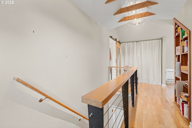 3416 SE 63rd Ave, Portland, OR 97206 - hall with light wood-style flooring and an upstairs landing