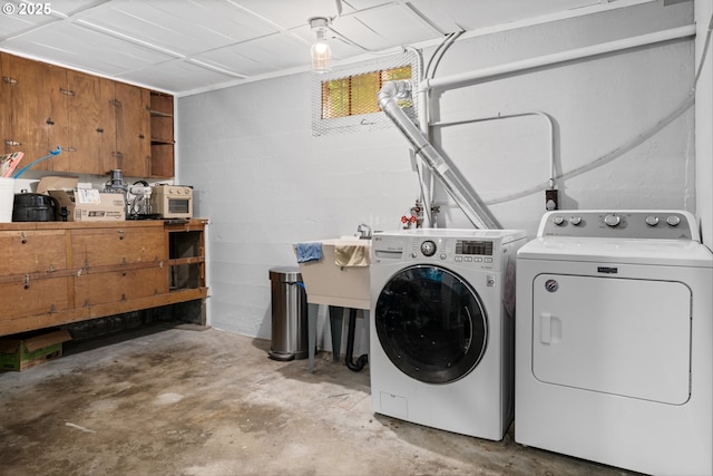 3416 SE 63rd Ave, Portland, OR 97206 - laundry room with separate washer and dryer and concrete block wall