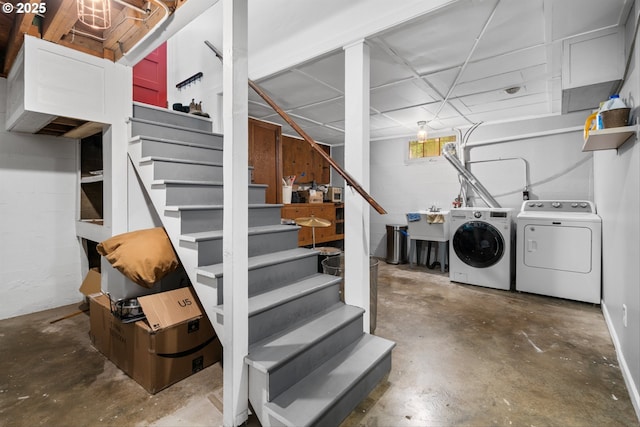 3416 SE 63rd Ave, Portland, OR 97206 - below grade area featuring washing machine and clothes dryer, stairs, and a sink