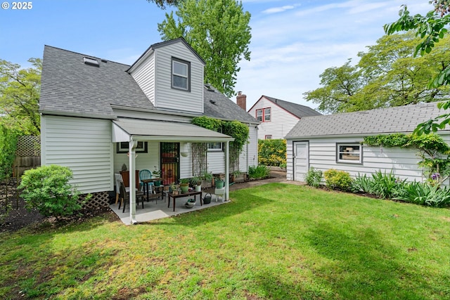 3416 SE 63rd Ave, Portland, OR 97206 - rear view of house with a patio and roof with shingles
