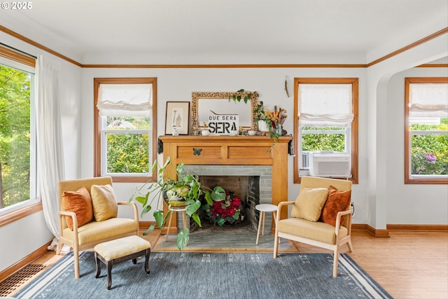 3416 SE 63rd Ave, Portland, OR 97206 - living area with healthy amount of natural light, baseboards, and wood finished floors