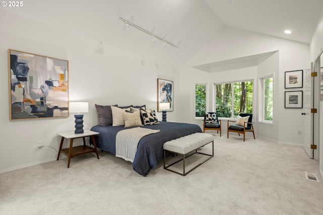 1911 NW Norfolk Ct, Portland, OR 97229 - carpeted bedroom featuring rail lighting, high vaulted ceiling, and recessed lighting