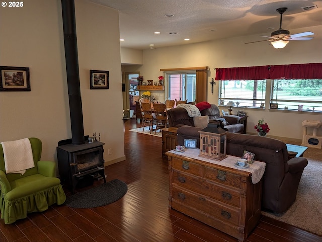264 Mattie K Ln, Roseburg, OR 97471 - living area with a wood stove, a ceiling fan, wood finished floors, and recessed lighting