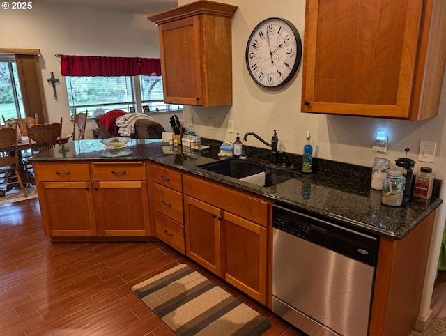 264 Mattie K Ln, Roseburg, OR 97471 - kitchen with dishwasher, a peninsula, dark wood finished floors, plenty of natural light, and a textured wall