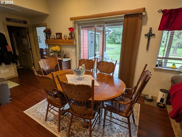 264 Mattie K Ln, Roseburg, OR 97471 - dining room featuring plenty of natural light and dark wood-type flooring