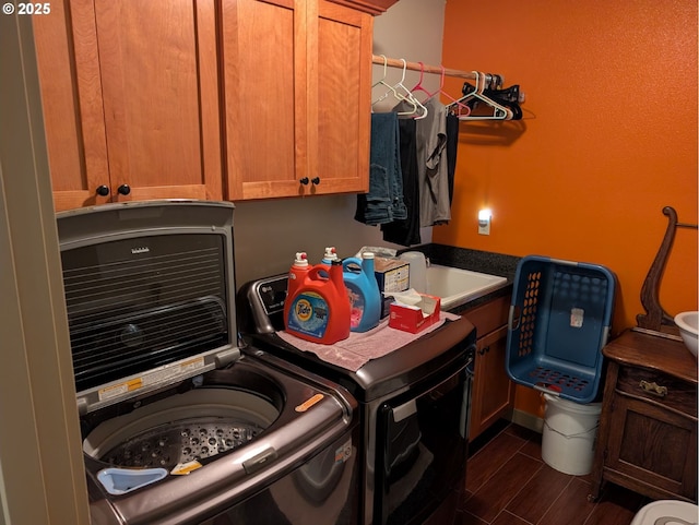 264 Mattie K Ln, Roseburg, OR 97471 - washroom featuring cabinet space, separate washer and dryer, and dark wood-style flooring