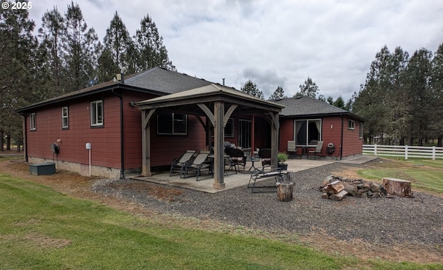 264 Mattie K Ln, Roseburg, OR 97471 - rear view of property with a gazebo, a patio, and a fire pit