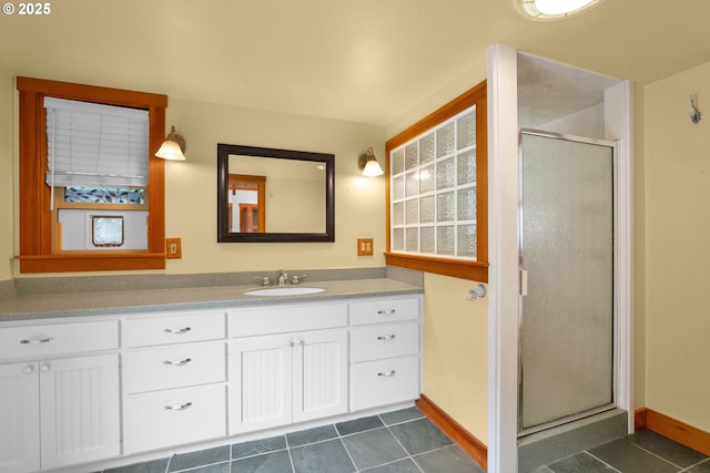 1710 Norkenzie Rd, Eugene, OR 97401 - full bath featuring vanity, a stall shower, baseboards, and tile patterned floors