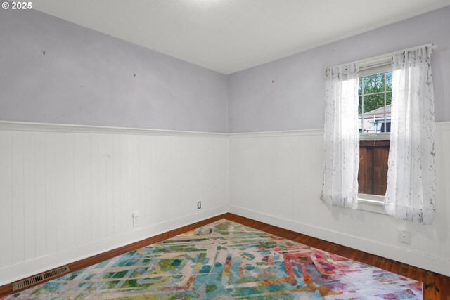 1710 Norkenzie Rd, Eugene, OR 97401 - spare room featuring wood finished floors and baseboards