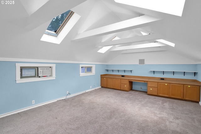 1710 Norkenzie Rd, Eugene, OR 97401 - unfurnished office featuring a skylight and light colored carpet