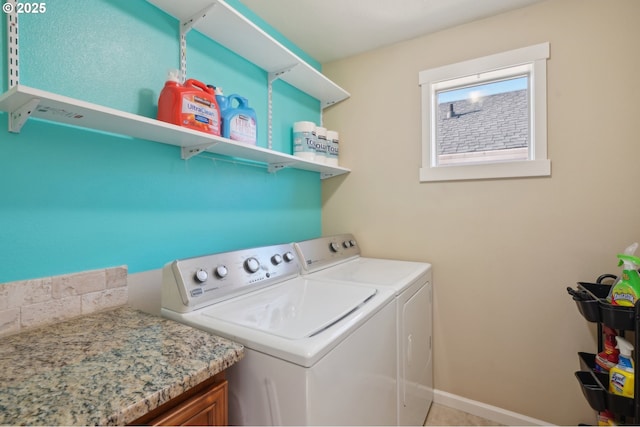 229 N 33rd Ct, Ridgefield, WA 98642 - laundry room featuring washer and clothes dryer and baseboards