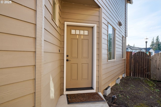 229 N 33rd Ct, Ridgefield, WA 98642 - doorway to property featuring a gate, fence, and a garage