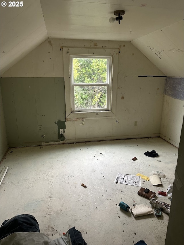 bonus room featuring lofted ceiling