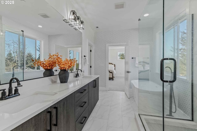 bathroom featuring wallpapered walls, visible vents, marble finish floor, and a sink