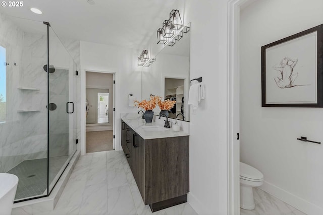 full bathroom featuring toilet, marble finish floor, a sink, a shower stall, and baseboards