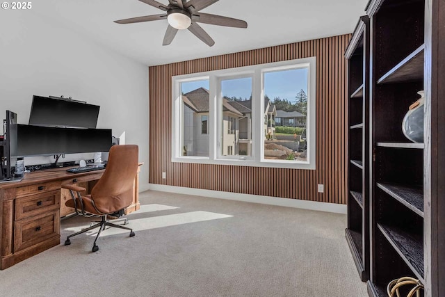 office with carpet flooring, a ceiling fan, and baseboards