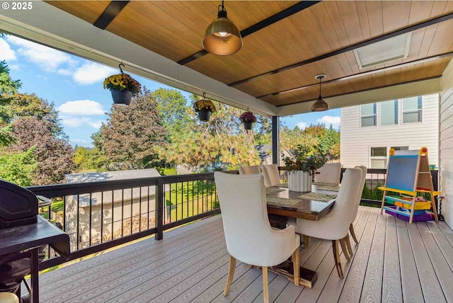 deck featuring outdoor dining space and ceiling fan