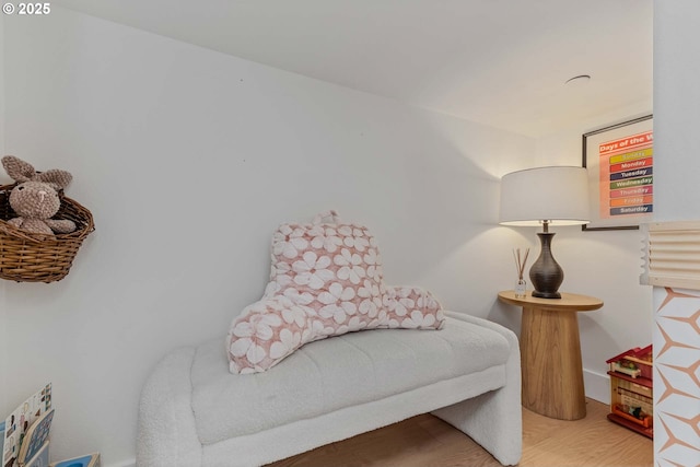 sitting room with wood finished floors