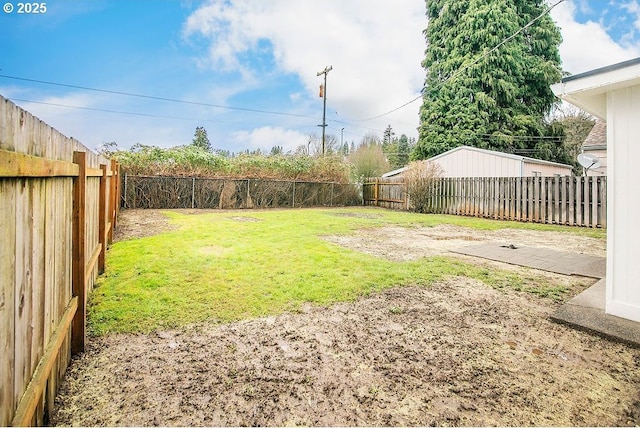 view of yard with a fenced backyard