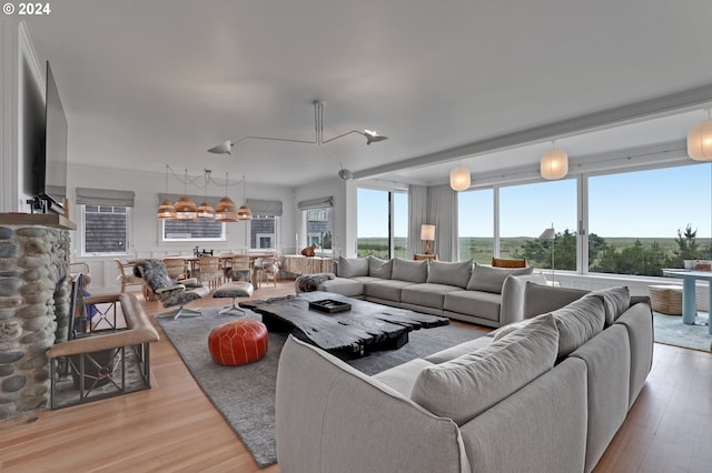 486 N Ocean Ave, Gearhart, OR 97138 - living area featuring wood finished floors and a healthy amount of sunlight