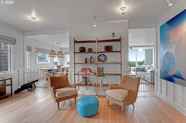 486 N Ocean Ave, Gearhart, OR 97138 - sitting room with crown molding and wood finished floors