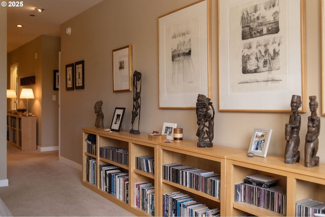 hallway with carpet, baseboards, and recessed lighting