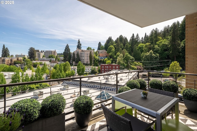 balcony featuring a city view