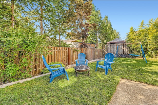 607 E Kennedy Ct, Carlton, OR 97111 - view of yard featuring a playground and a fire pit