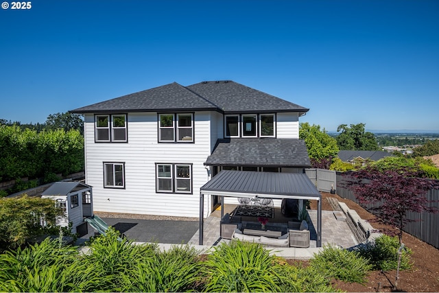 840 Chikamin Loop, Silverton, OR 97381 - rear view of property with a gazebo, outdoor lounge area, roof with shingles, a fenced backyard, and a patio