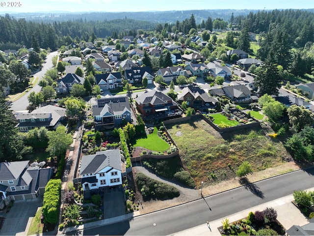 840 Chikamin Loop, Silverton, OR 97381 - aerial perspective of suburban area featuring a heavily wooded area