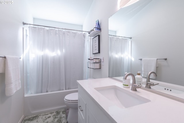 full bath featuring vanity, shower / bath combination with curtain, and toilet