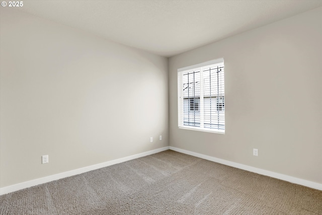 385 SW Mitchum Ter, Beaverton, OR 97006 - carpeted empty room featuring baseboards